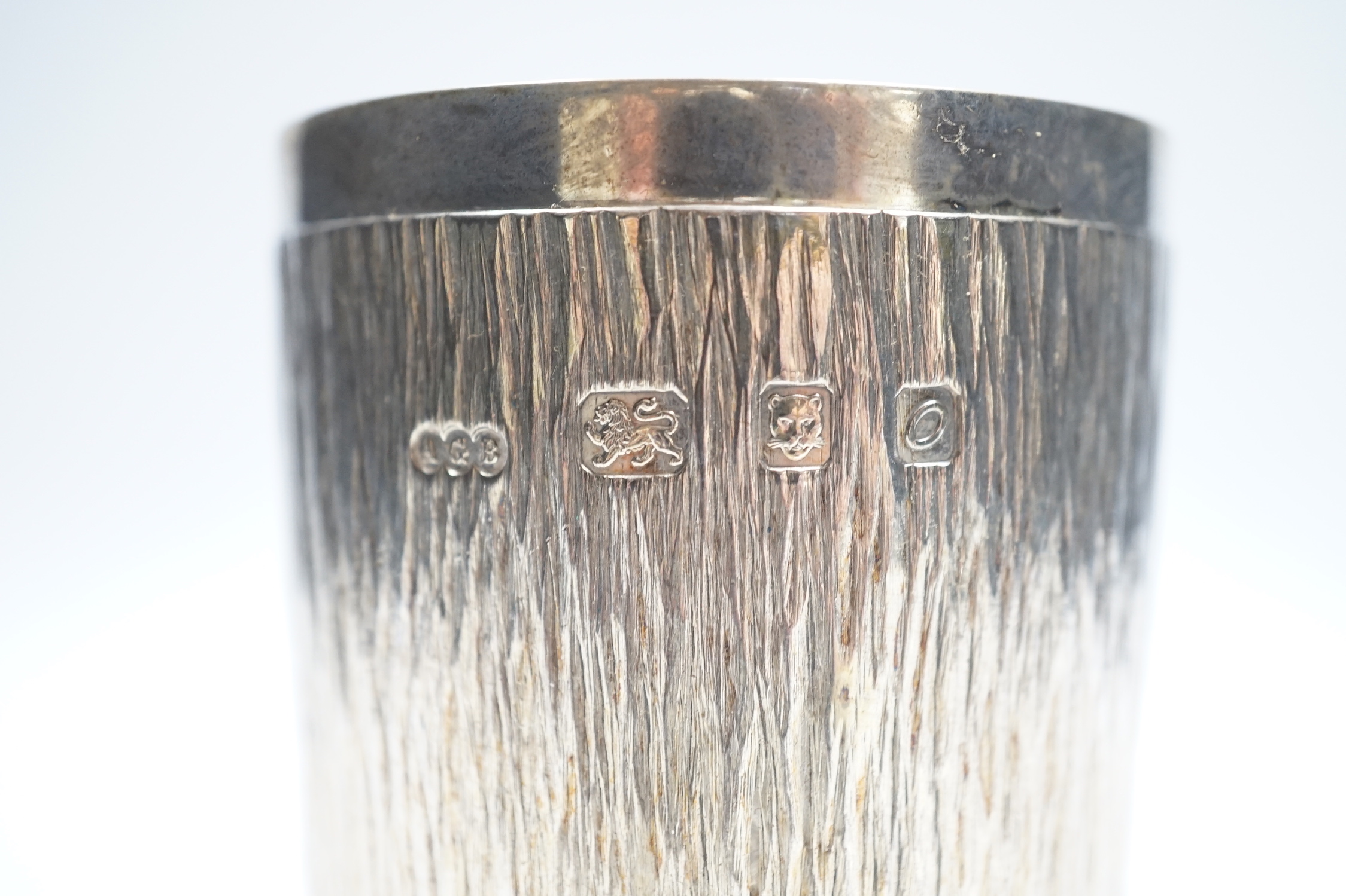 An Elizabeth II bark finish silver pedestal goblet, by Adrian Gerald Benney, London, 1969, 10.4cm, 7.3oz.
